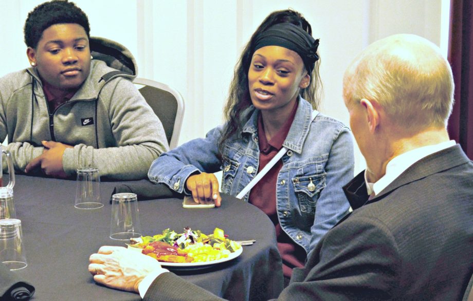 5 – High school students talk to the Hon. Matthew Kennelly past president of the Chicago Chapter at lunch