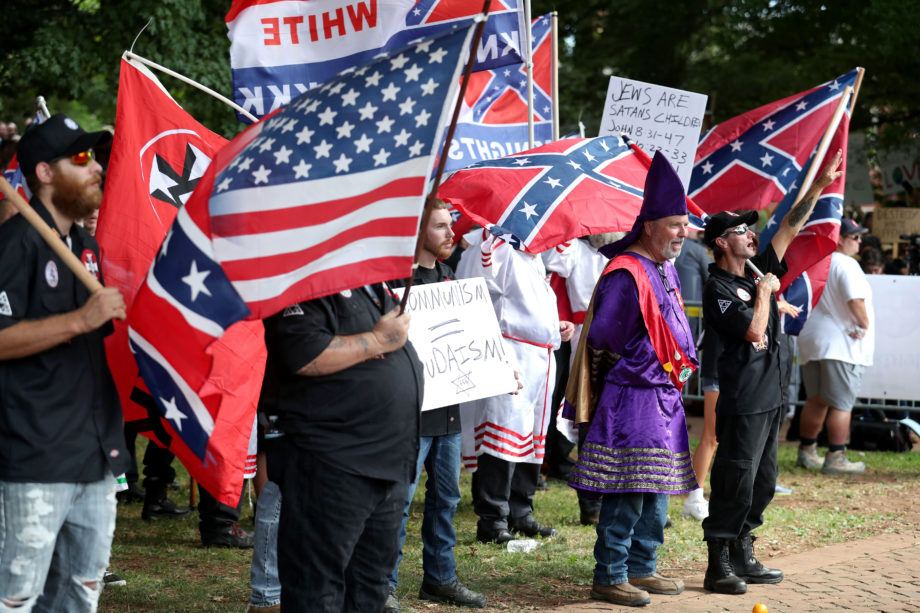 Members of the Loyal White Knights of the Ku Klux Klan rally at Justice Park on Saturday, July 8, 2017.